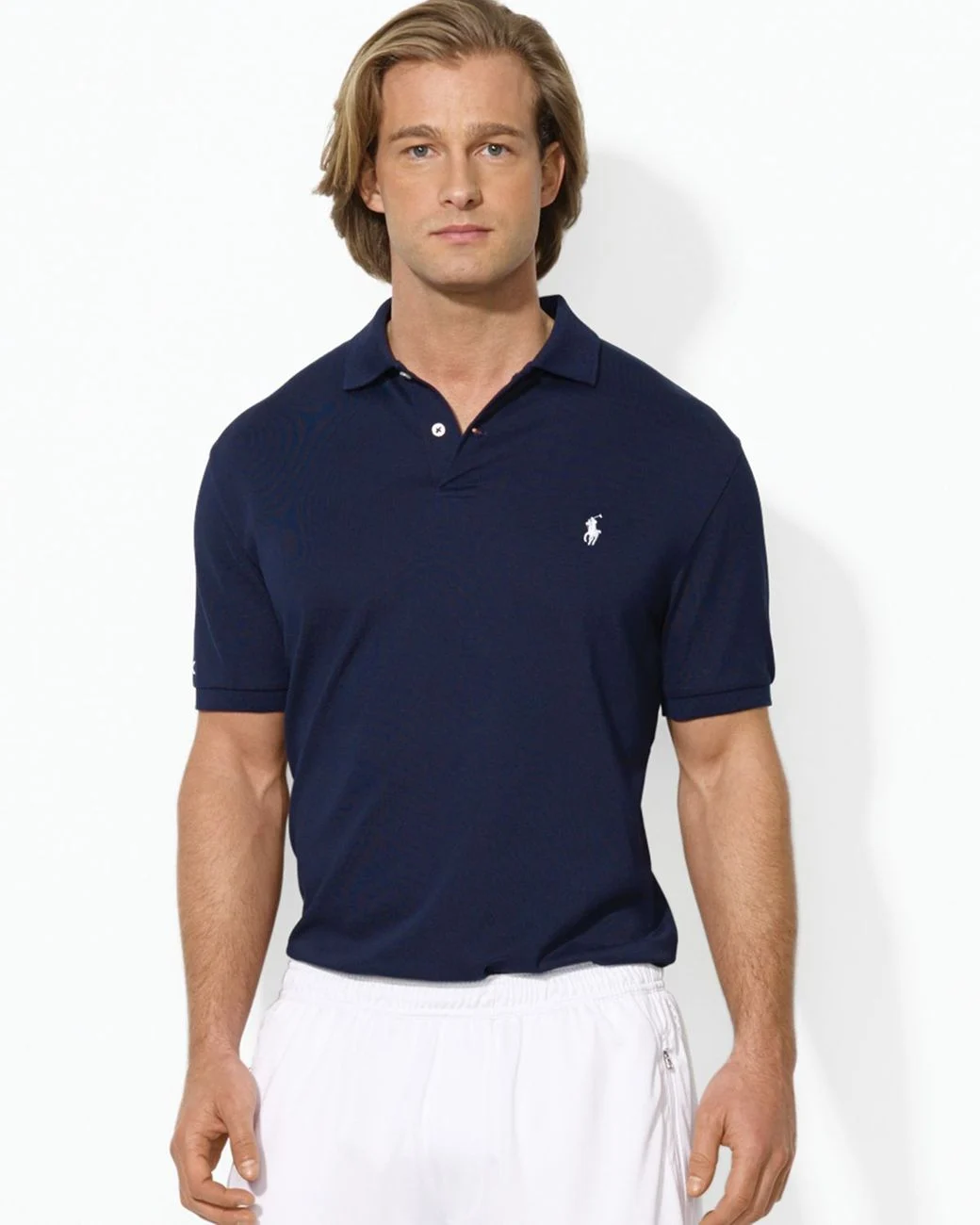 เสื้อโปโลผ้านวัตกรรมระบายอากาศ (Performance Polo Shirt) — 10 ทรงเสื้อและแพทเทิร์นยอดนิยมสำหรับการสั่งผลิตเสื้อผ้าแฟชั่นและยูนิฟอร์มองค์กรปี 2026